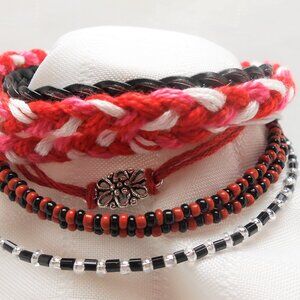 Handmade bracelet with rows of threads, beads, and charms No. 236